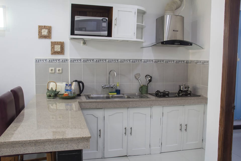 Apartment, 1 Bedroom | In-room safe, desk, iron/ironing board, free cribs/infant beds