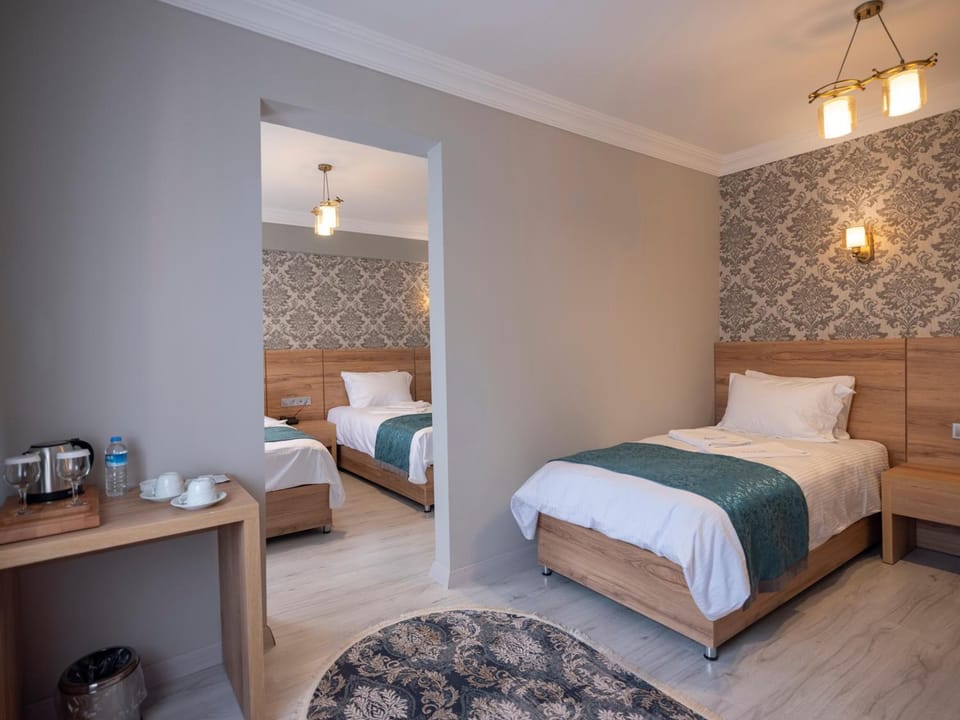 Premium bedding, memory foam beds, minibar, in-room safe