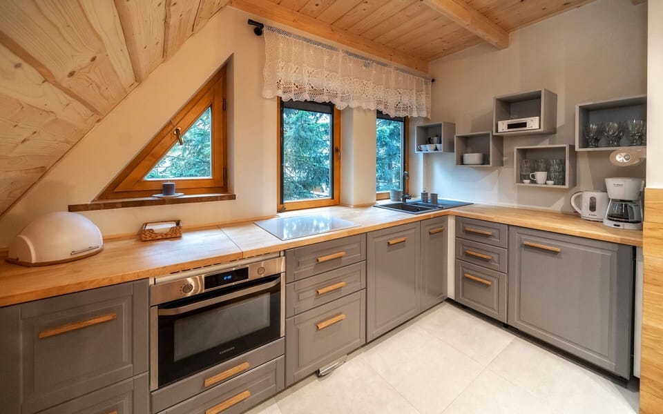 Family Apartment | Private kitchen | Full-size fridge, stovetop, coffee/tea maker, electric kettle