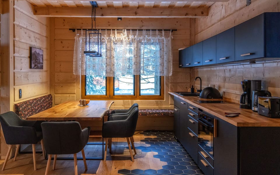Suite, 2 Bedrooms | Private kitchen | Full-size fridge, stovetop, coffee/tea maker, electric kettle