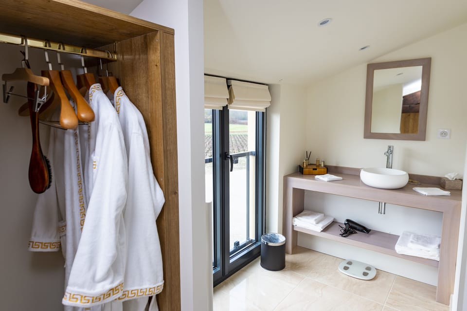 Twin Room (Magdelaine noire) | Bathroom | Shower, rainfall showerhead, free toiletries, hair dryer