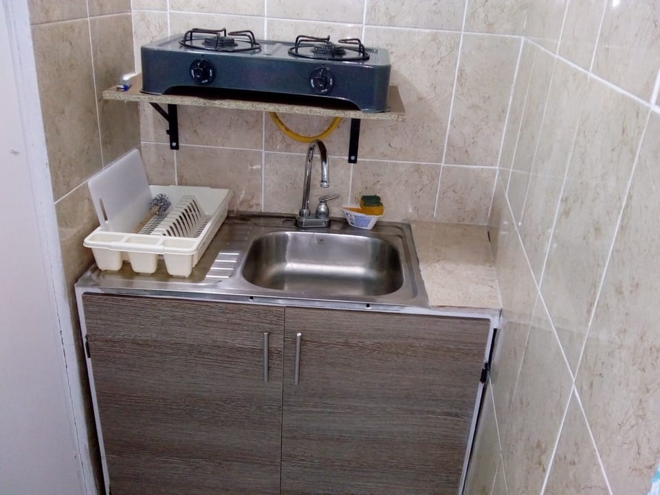 Junior Chalet | Private kitchen | Full-size fridge, microwave, oven, stovetop
