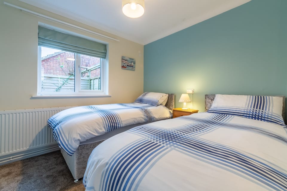 Bedroom two with 3ft twin single beds