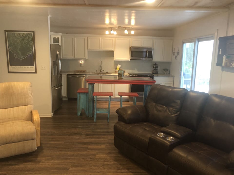 View of great room from sunroom entry. 