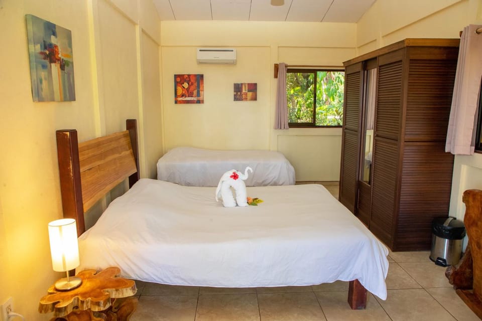 Down comforters, pillowtop beds, in-room safe, desk