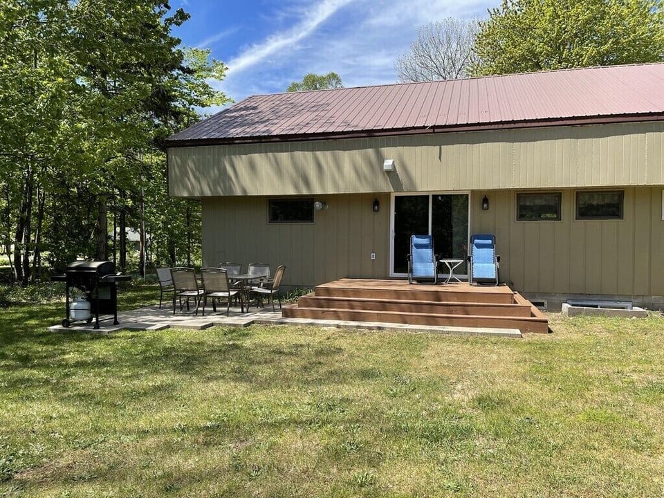 Recently added deck and patio area off dining room slider with gas grill