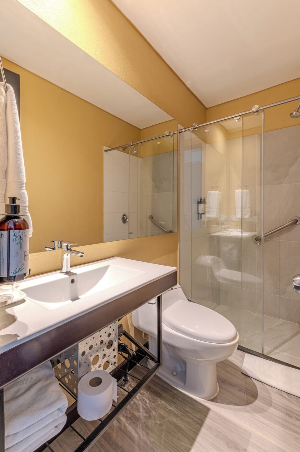 Shower, rainfall showerhead, hair dryer, towels