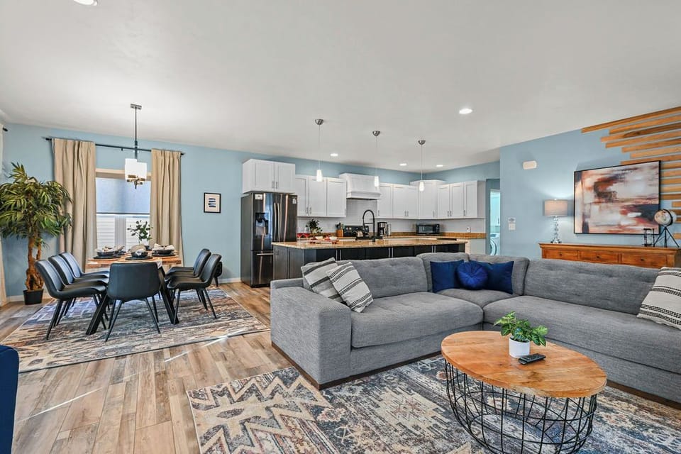 Relax in the open-concept living area with cozy seating.   