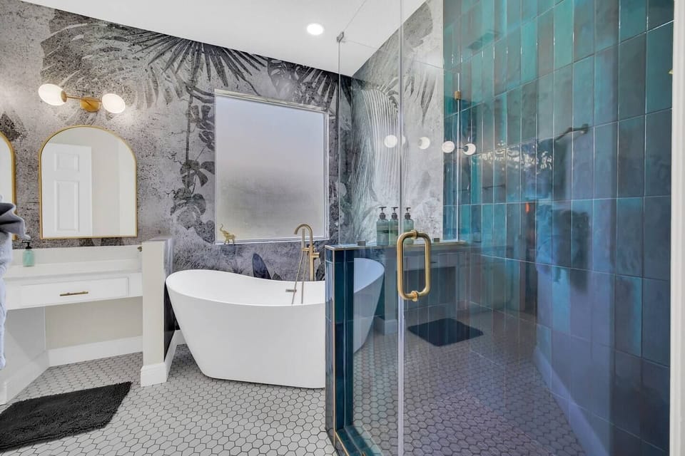 You will love the luxurious feeling after a long day at the park under the rain shower head or soaking in our modern free standing tub! 