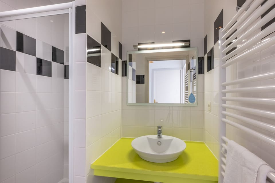 A refreshing bathroom to help you unwind after a day of exploring.