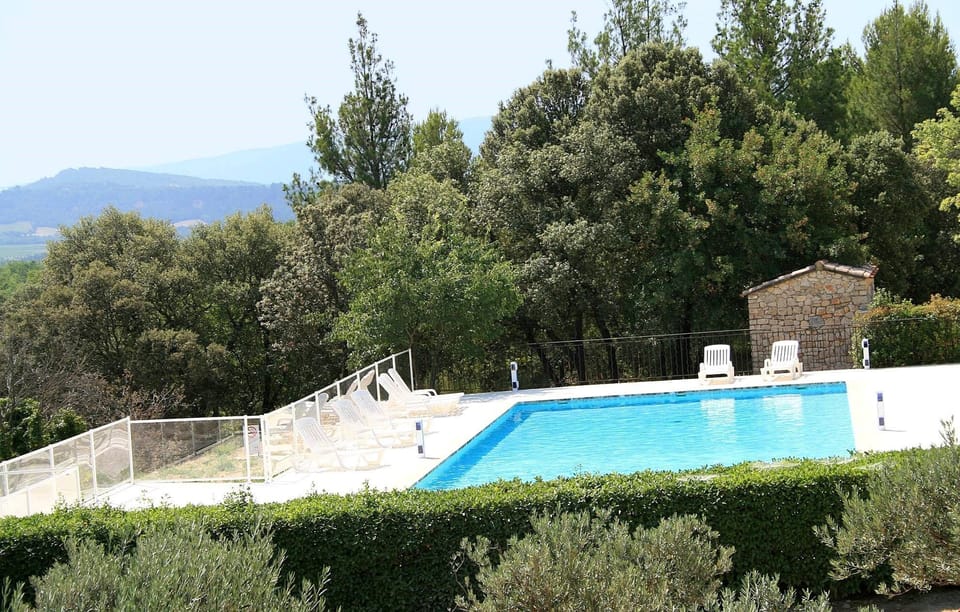 Set in lush, wooded grounds, there is plenty of privacy surrounding the pool.