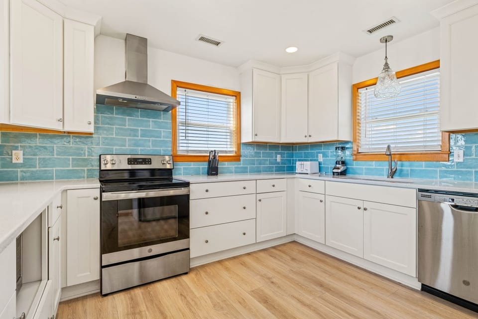 Kitchen with Bar Seating on Third Level
