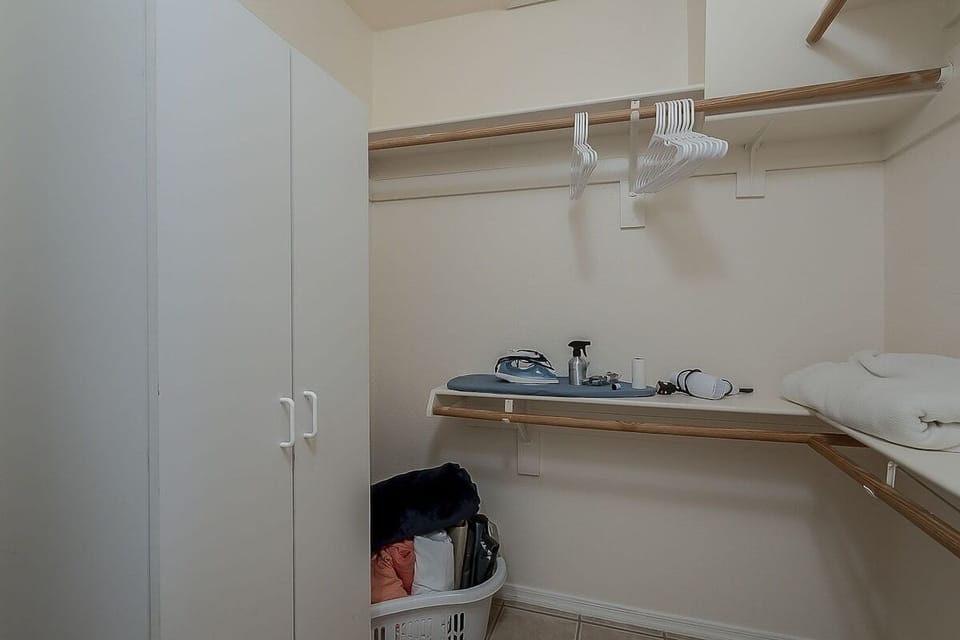 Stay organized with provided hangers, plus an iron and ironing board for your convenience