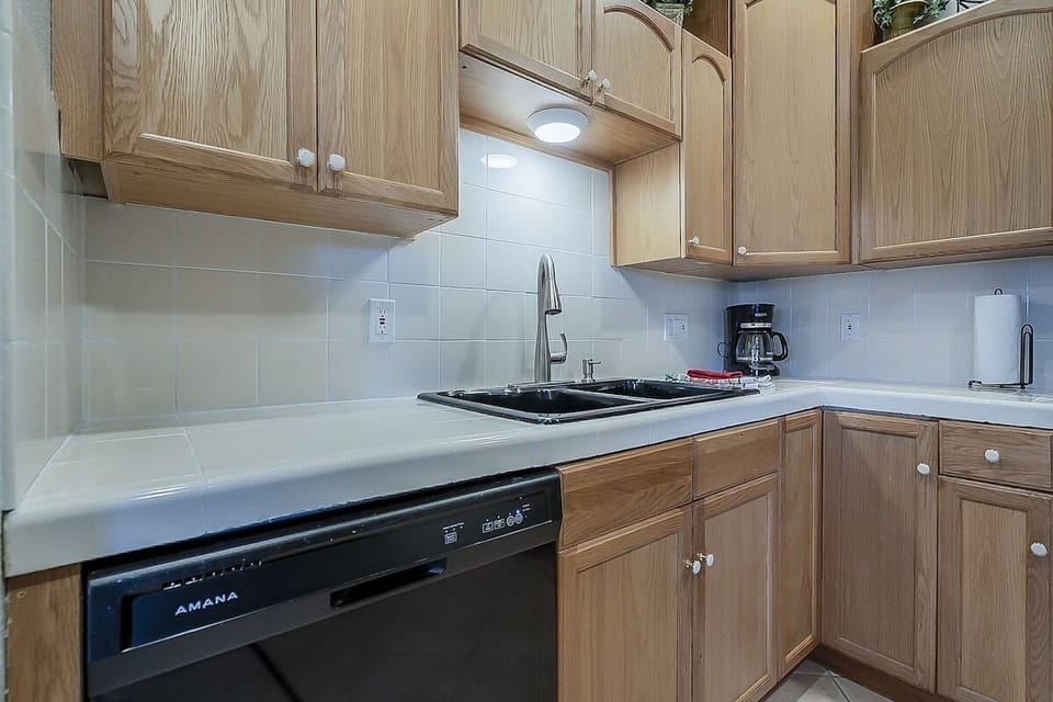 Enjoy ample counter space for prep, plus a dishwasher and coffee maker for easy, relaxed mornings