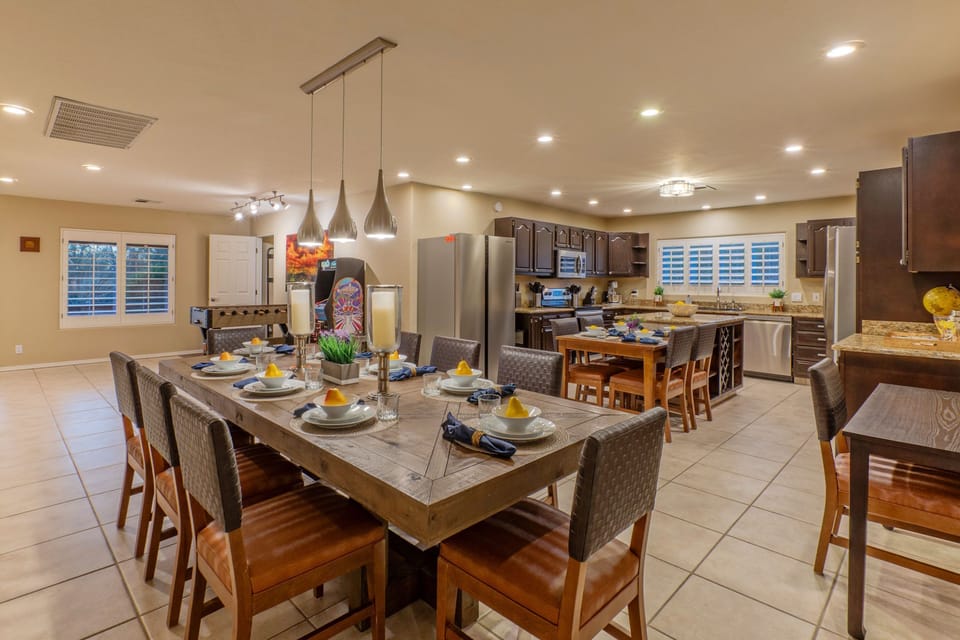 Spacious kitchen and dining area have enough table seating for a large crowd