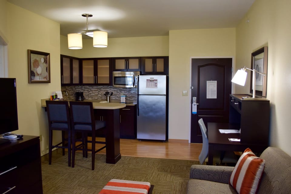 Curb your appetite by cooking a meal in your kitchen.