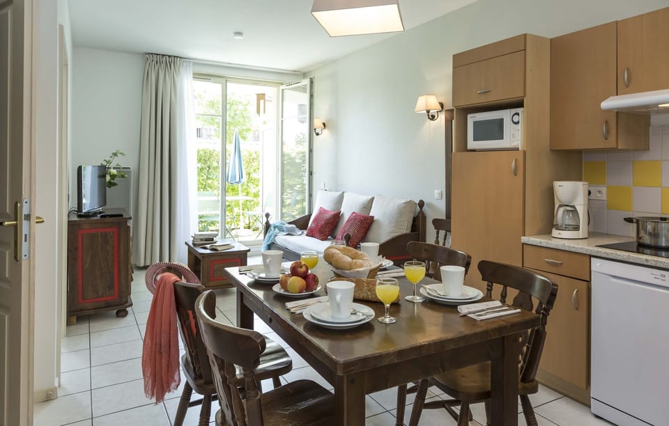 Enjoy a meal at the dining table.