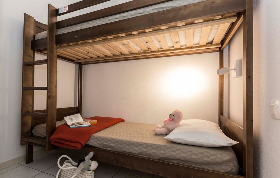 Drift to sleep in the bunk beds.