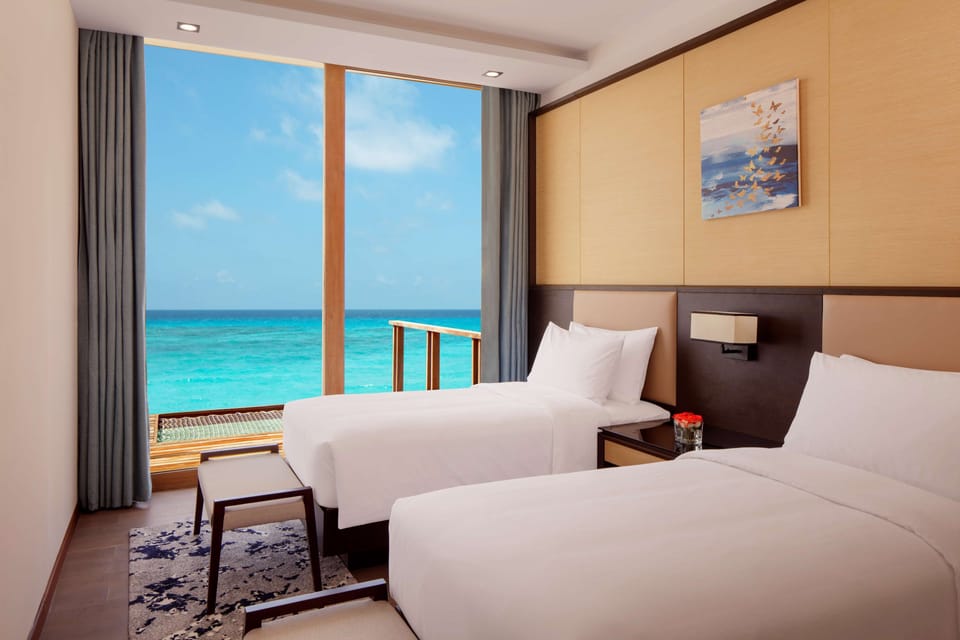 Egyptian cotton sheets, premium bedding, minibar, in-room safe