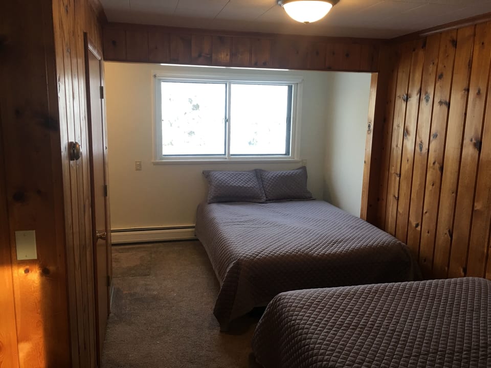 Bedroom two, with full bathroom, upper level.