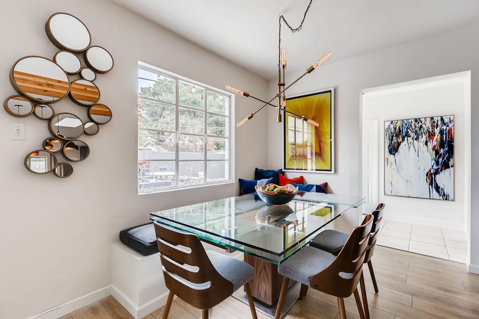 Dining area with table for 8 and views of the pool