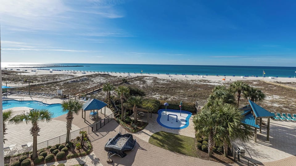 Relax on your balcony, soaking in the stunning coastal views and the soothing sounds of the beach