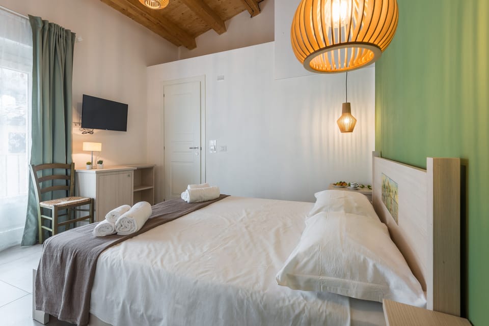 Basic Double Room | Down comforters, minibar, individually decorated, individually furnished
