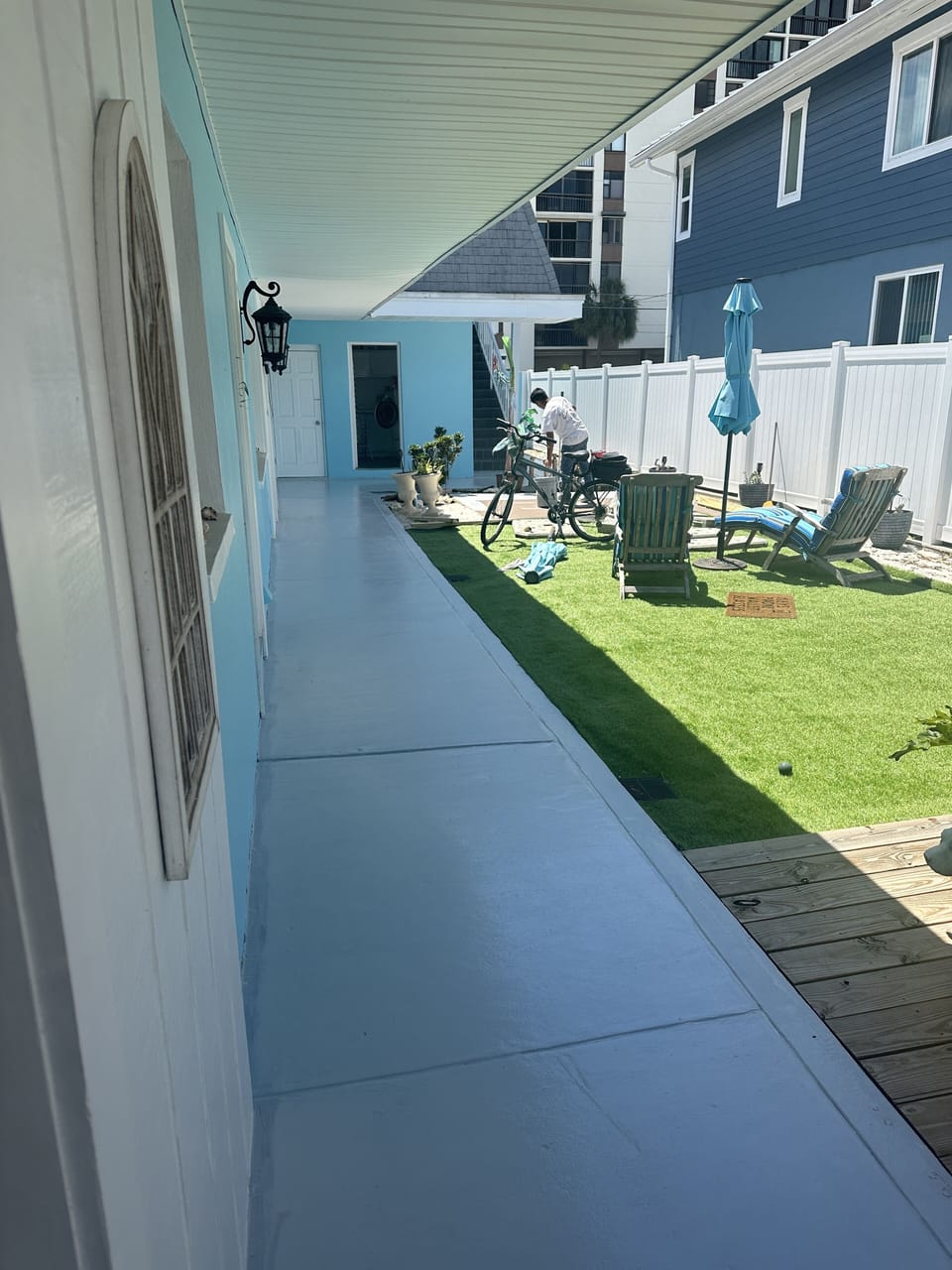 Personal courtyard with grill and corn hole