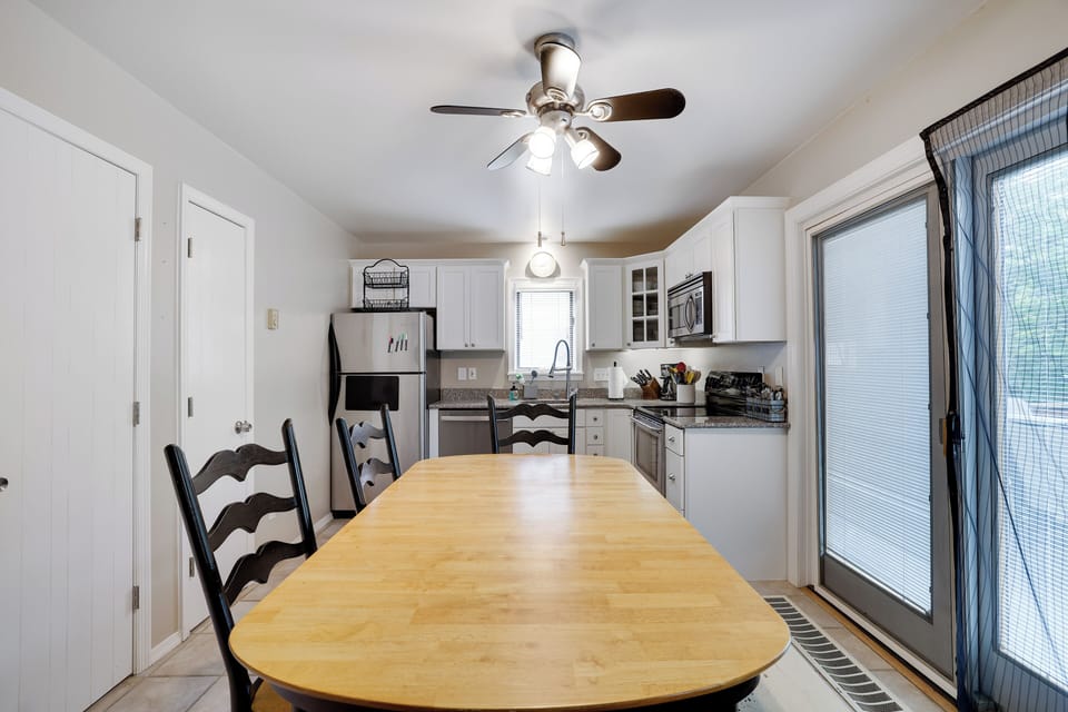 Dining area, access to deck. Two large pantries