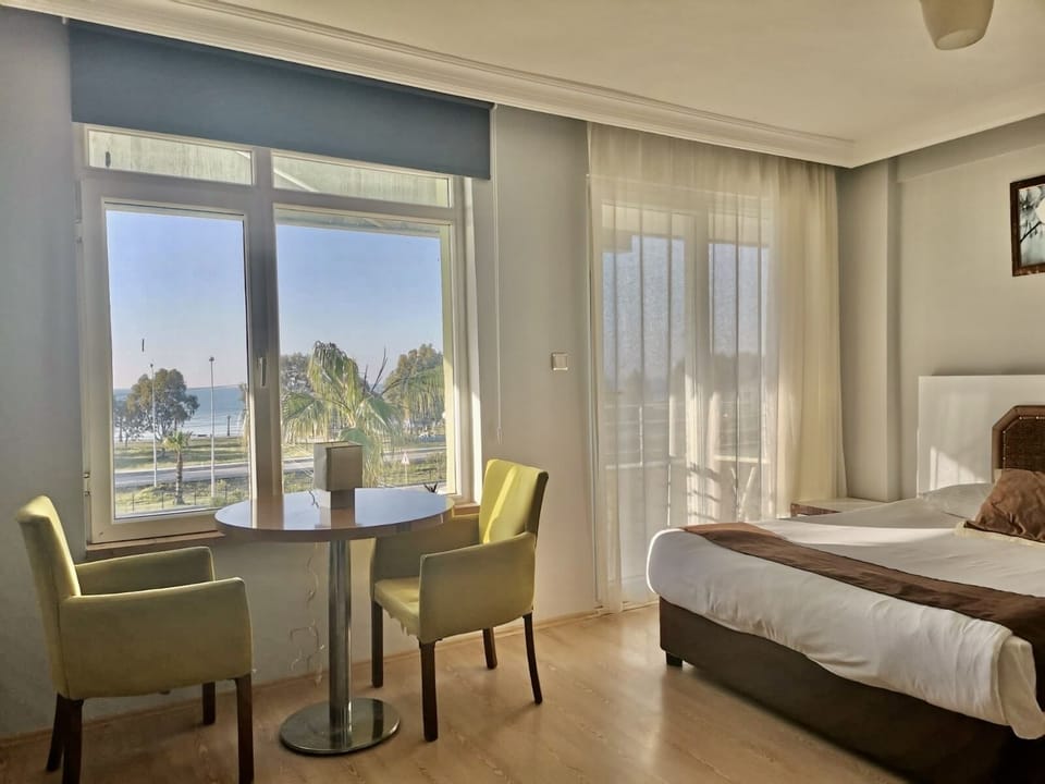 Superior Triple Room | In-room safe, desk, blackout drapes, iron/ironing board