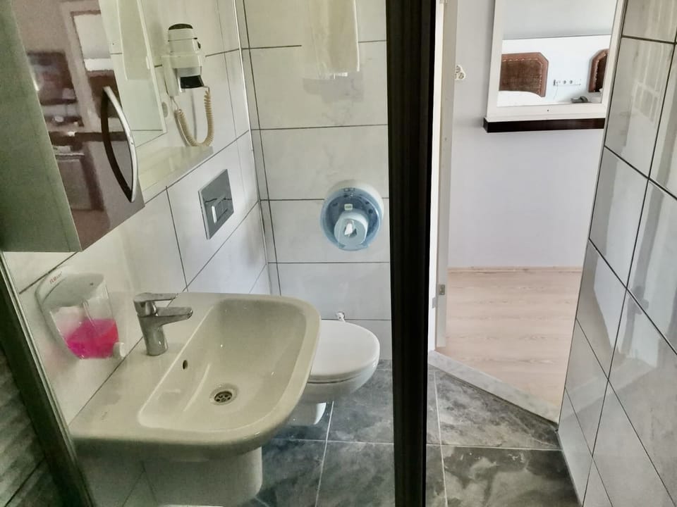Shower, hair dryer, slippers