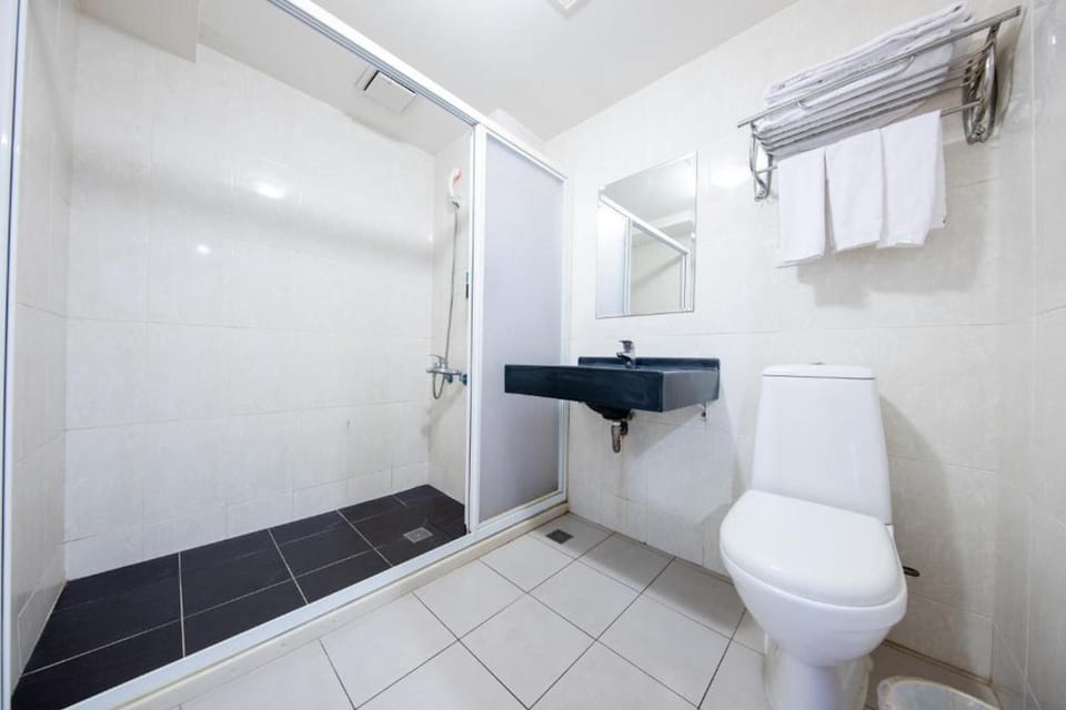 Shower, eco-friendly toiletries, hair dryer, slippers