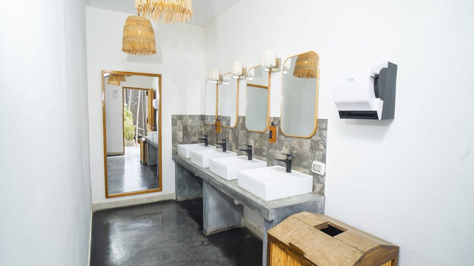 Cylinder with Shared Bathroom | Bathroom | Soap, shampoo, toilet paper