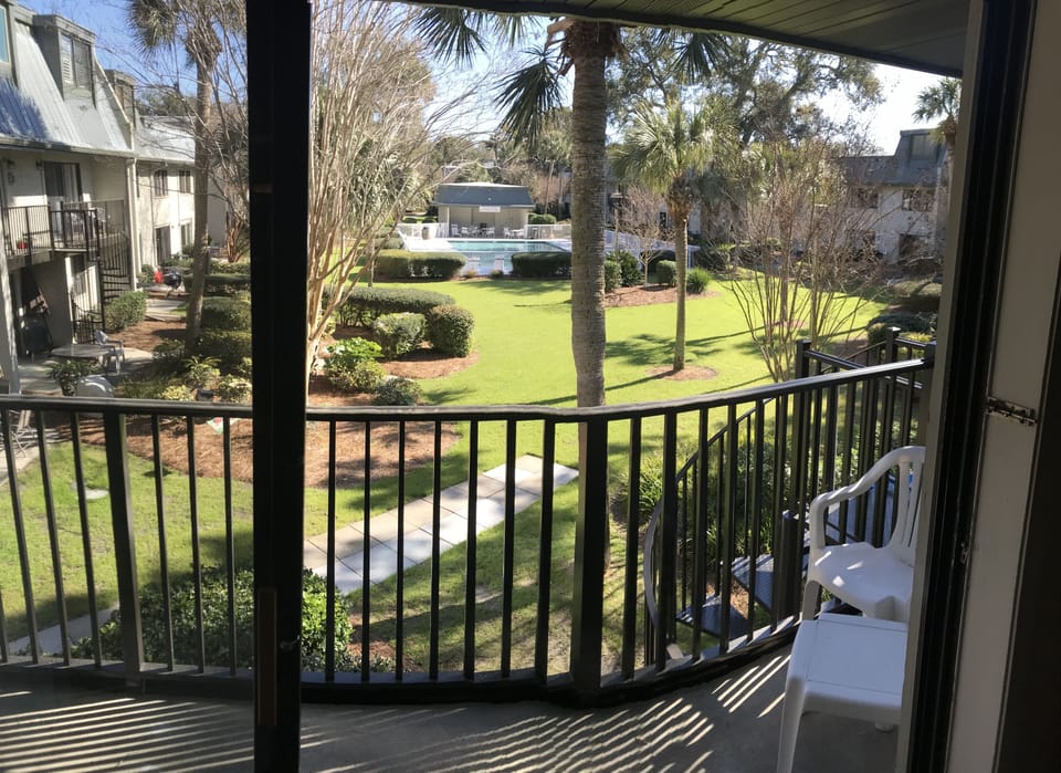  unit views, spiral stairs to landing and steps to the beach