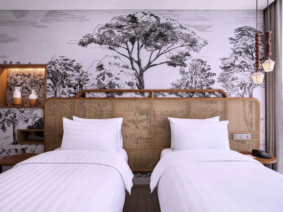 Superior Twin Room, 2 Twin Beds | Minibar, in-room safe, blackout drapes, soundproofing