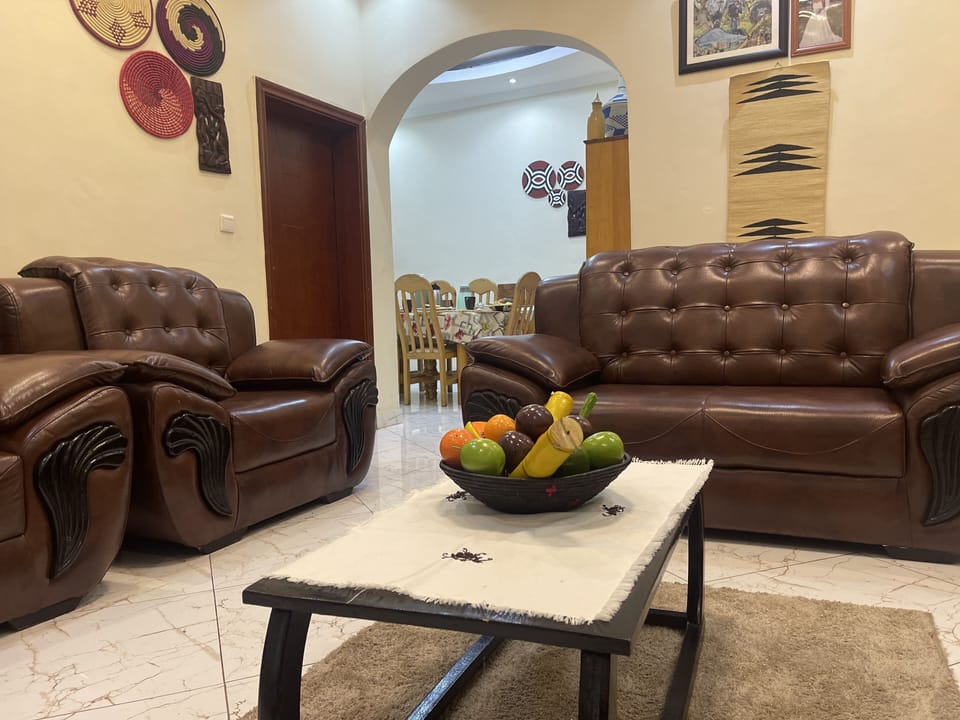 Standard Triple Room, 1 King Bed, Garden View | Living room | Fireplace