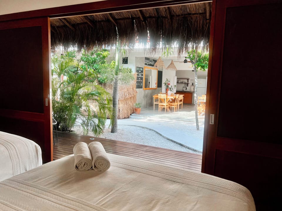 Deluxe Quadruple Room | In-room safe, WiFi (free), bed sheets