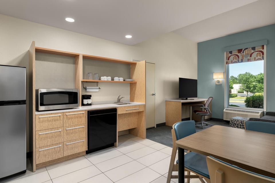 Suite, 1 Queen Bed, Accessible (Hearing Roll In Shower) | Private kitchen | Full-size fridge, microwave, stovetop, dishwasher