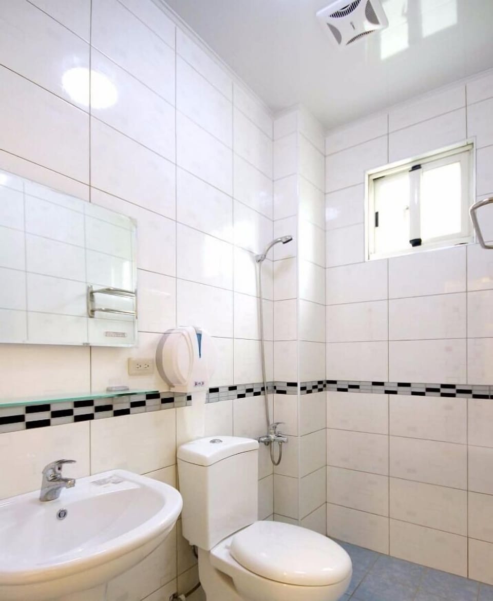 Shower, free toiletries, hair dryer, slippers