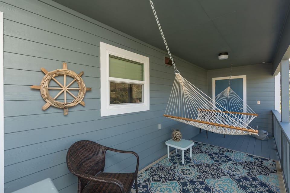 Take a nap or read a book in the hammock and listen to the waves.