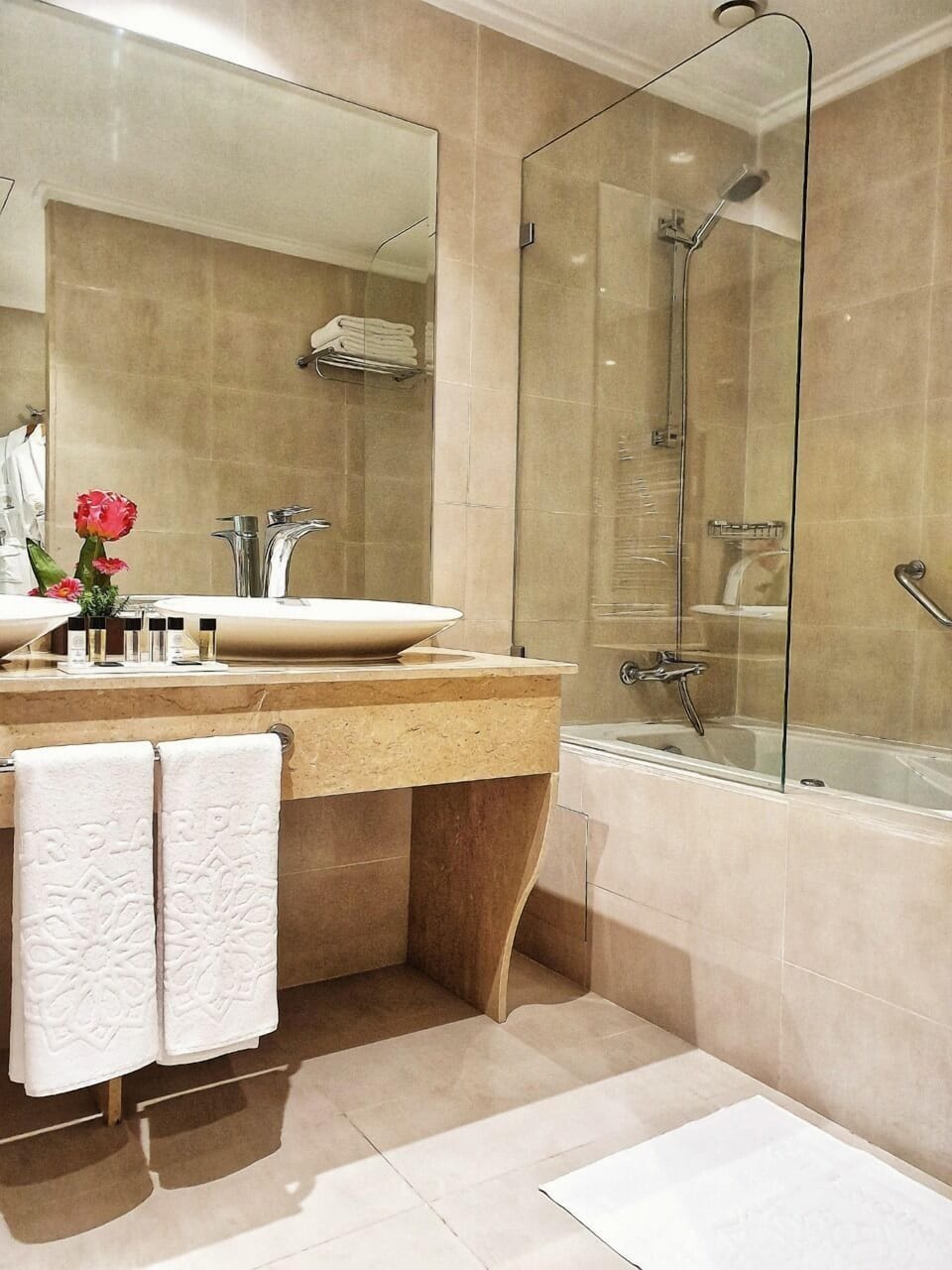 Designer toiletries, hair dryer, bidet, towels
