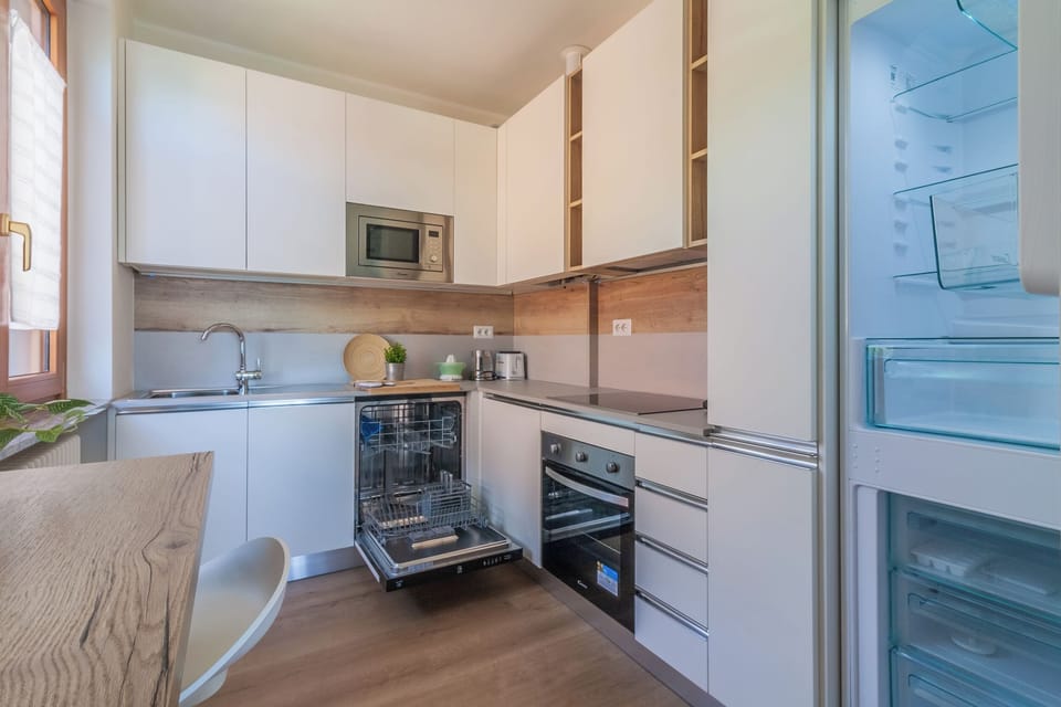 Apartment, 2 Bedrooms | Private kitchen | Full-size fridge, microwave, oven, stovetop