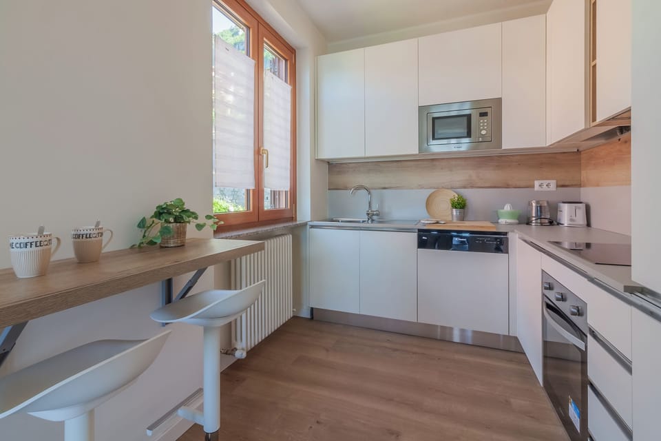 Apartment, 2 Bedrooms | Private kitchen | Full-size fridge, microwave, oven, stovetop