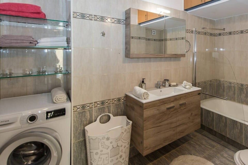 First Bathroom with Modern Fixtures – Clean, airy, and perfectly maintained.