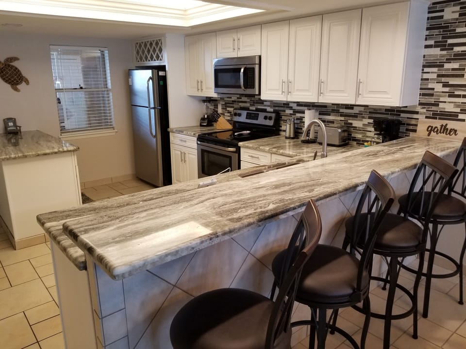 Kitchen and breakfast bar