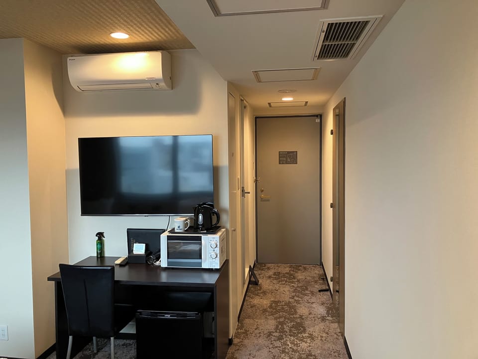 Desk, iron/ironing board (on request), WiFi (free)