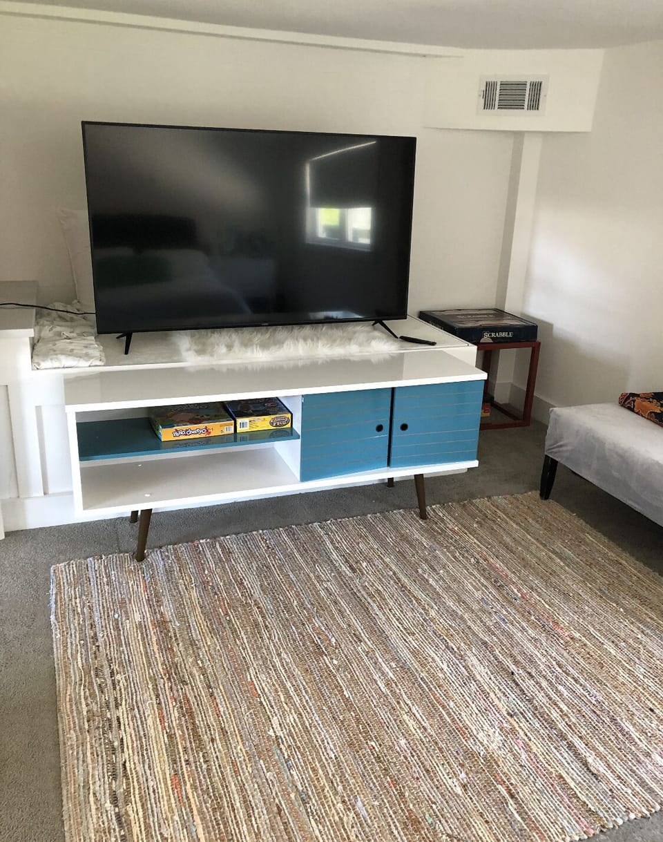 tv area in the downstairs full size bed