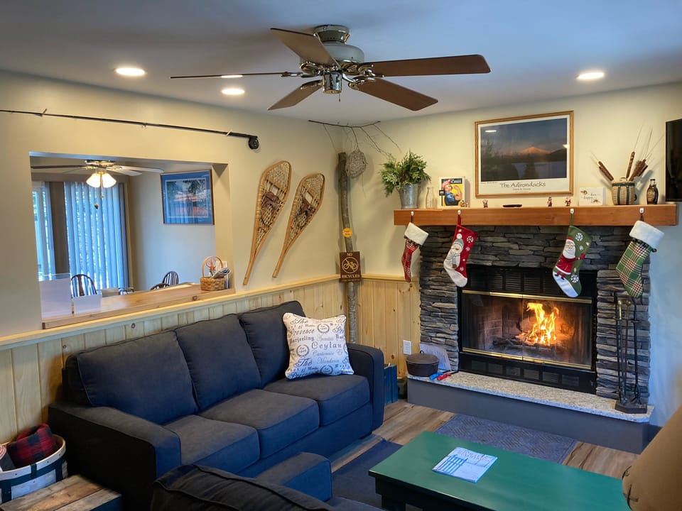 Cozy living room. Wood burning fireplace. Tastefully decorated 
