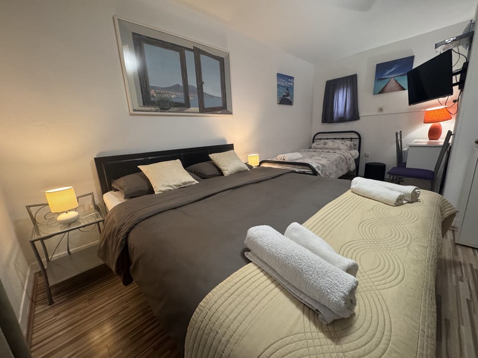 Triple Room (Zoran) | Memory foam beds, blackout drapes, free WiFi