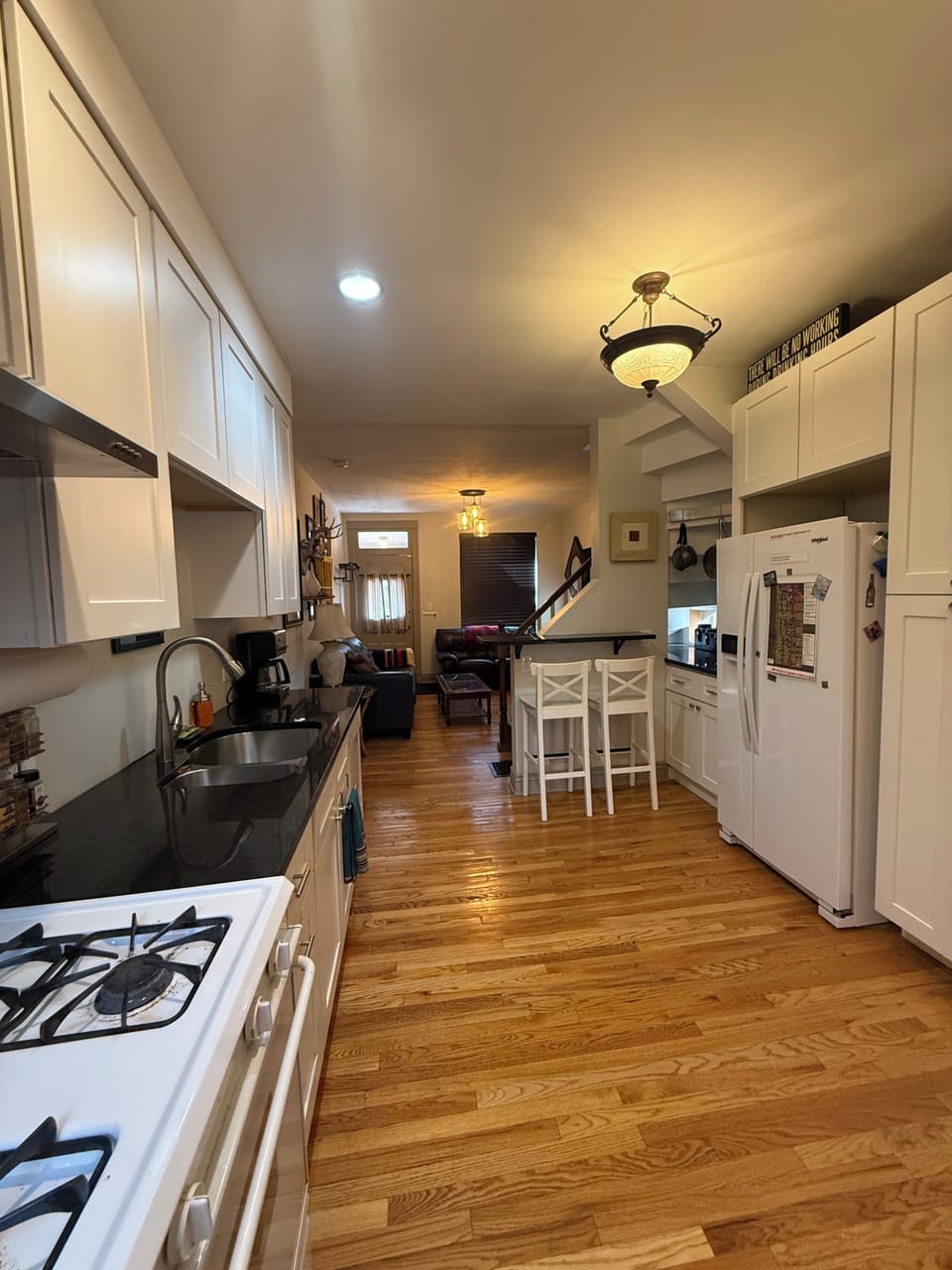 View kitchen to living area. Small breakfast nook perfect for working.